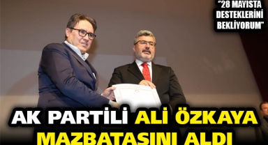 AK PARTİLİ ÖZKAYA MAZBATASINI ALDI